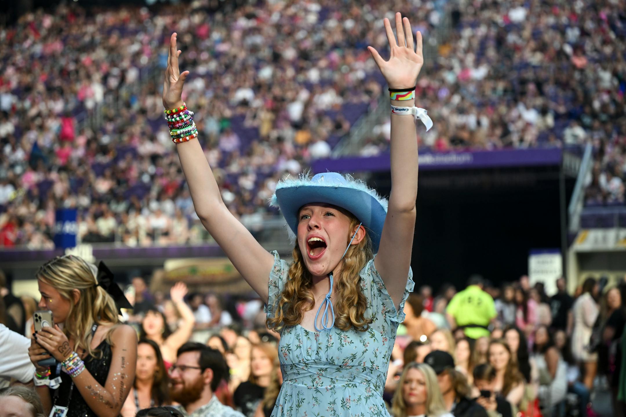 A fan cheers during the "Girl in Red" opening act Friday, June 23, 2023, at US Bank Stadium in Minneapolis, Minn.