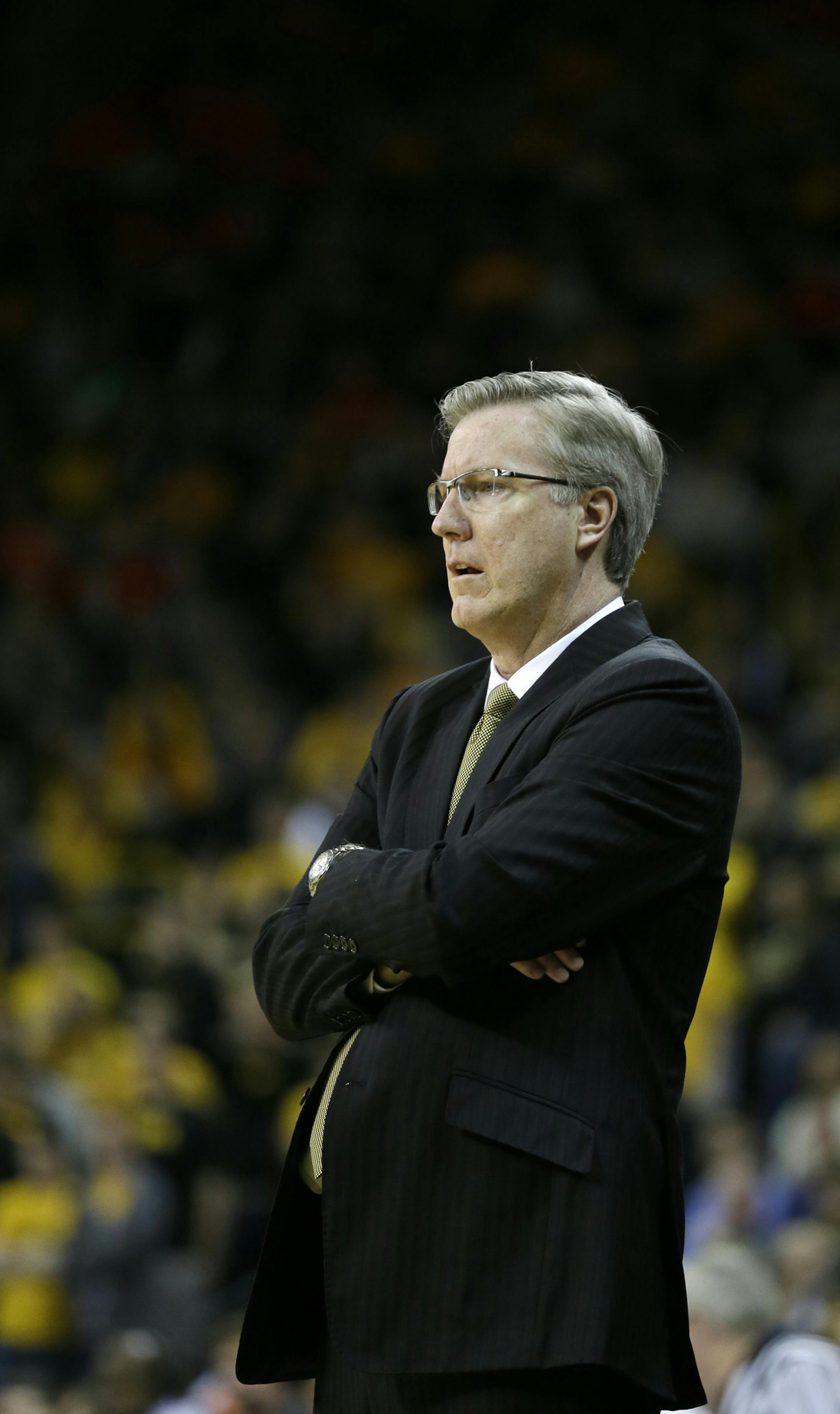 Iowa head coach Fran McCaffery looks on during the second half of an NCAA college basketball game against Illinois, Saturday, March 8, 2014, in Iowa City, Iowa. Illinois won 66-63. (AP Photo/Charlie Neibergall)