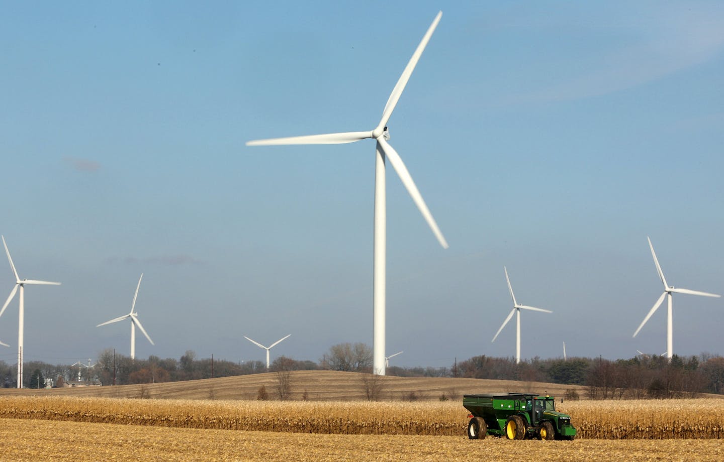 Windmills dot the landscape as a farmer harvested corn near Alden, Minn. Scenes like this have caused residents south of the area such as Dorenne Hansen to become more vocal in their opposition to the proposed project. ] ANTHONY SOUFFLE &#xef; anthony.souffle@startribune.com Dorenne Hansen, the head of a property owners association fighting a proposed wind farm, spoke during an interview and gave a tour of her property Wednesday, Nov. 8, 2017 in Glenville, Minn. Hansen is concerned for the noise