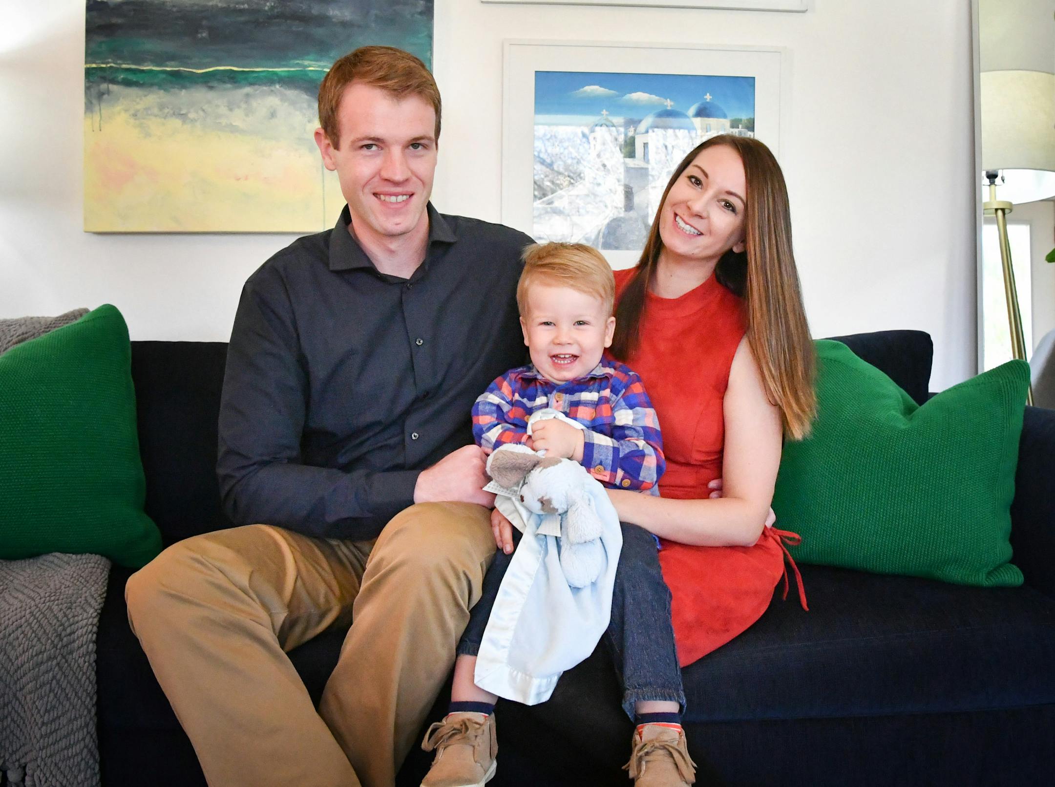 E.J. and Lyndsie Adams with their son, Archer.