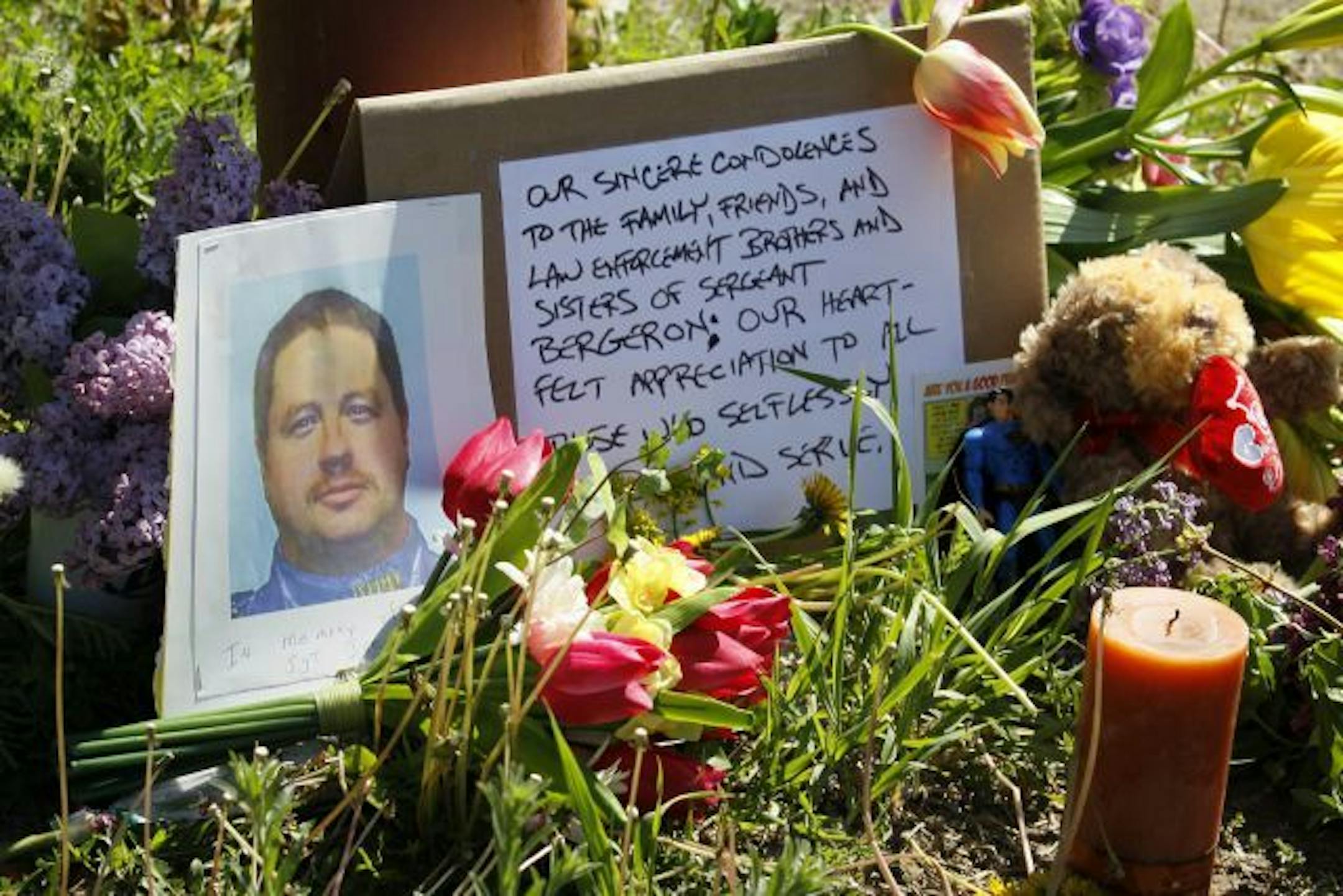 A steady stream of people came to the memorial site to leave flowers, stand in silence and memoralize the life of Sgt. Joe Bergeron Sunday morning.