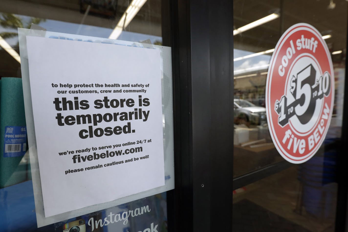 FILE - In this April 23, 2020 file photo, a sign is posted on a closed store in North Miami, Fla. Small businesses hoping for more leeway in using coronavirus loan money were disappointed as the government released instructions for seeking forgiveness for the loans. Forms the Small Business Administration released late Friday, May 15, 2020 didn't address two concerns shared by many owners about the Paycheck Protection Program. (AP Photo/Wilfredo Lee, File)