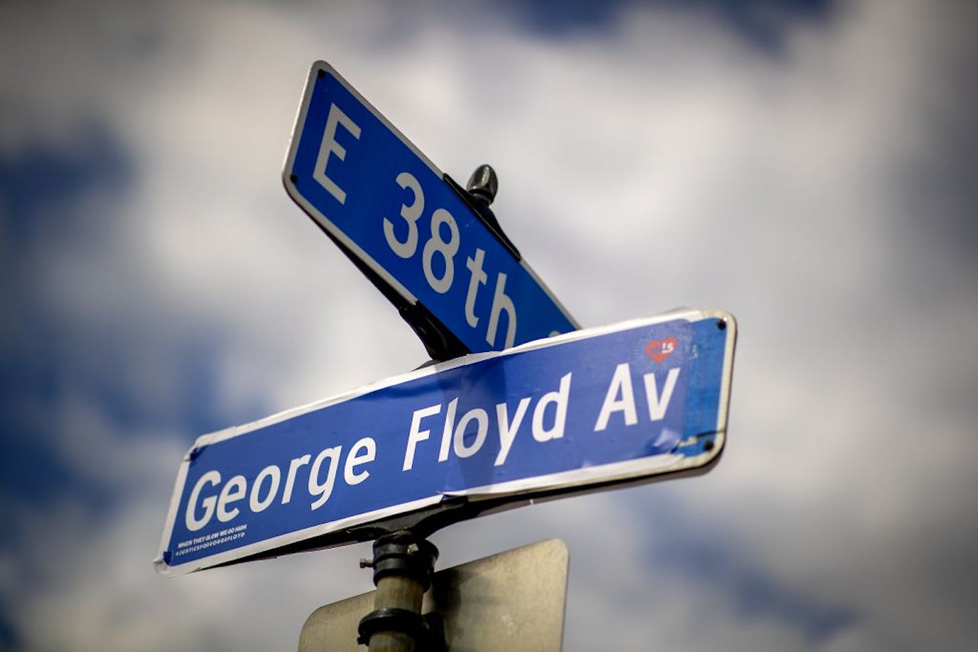 A makeshift George Floyd Av. street sign was posted near the George Floyd memorial at 38th and Chicago, Saturday, June 13, 2020 in Minneapolis, MN.