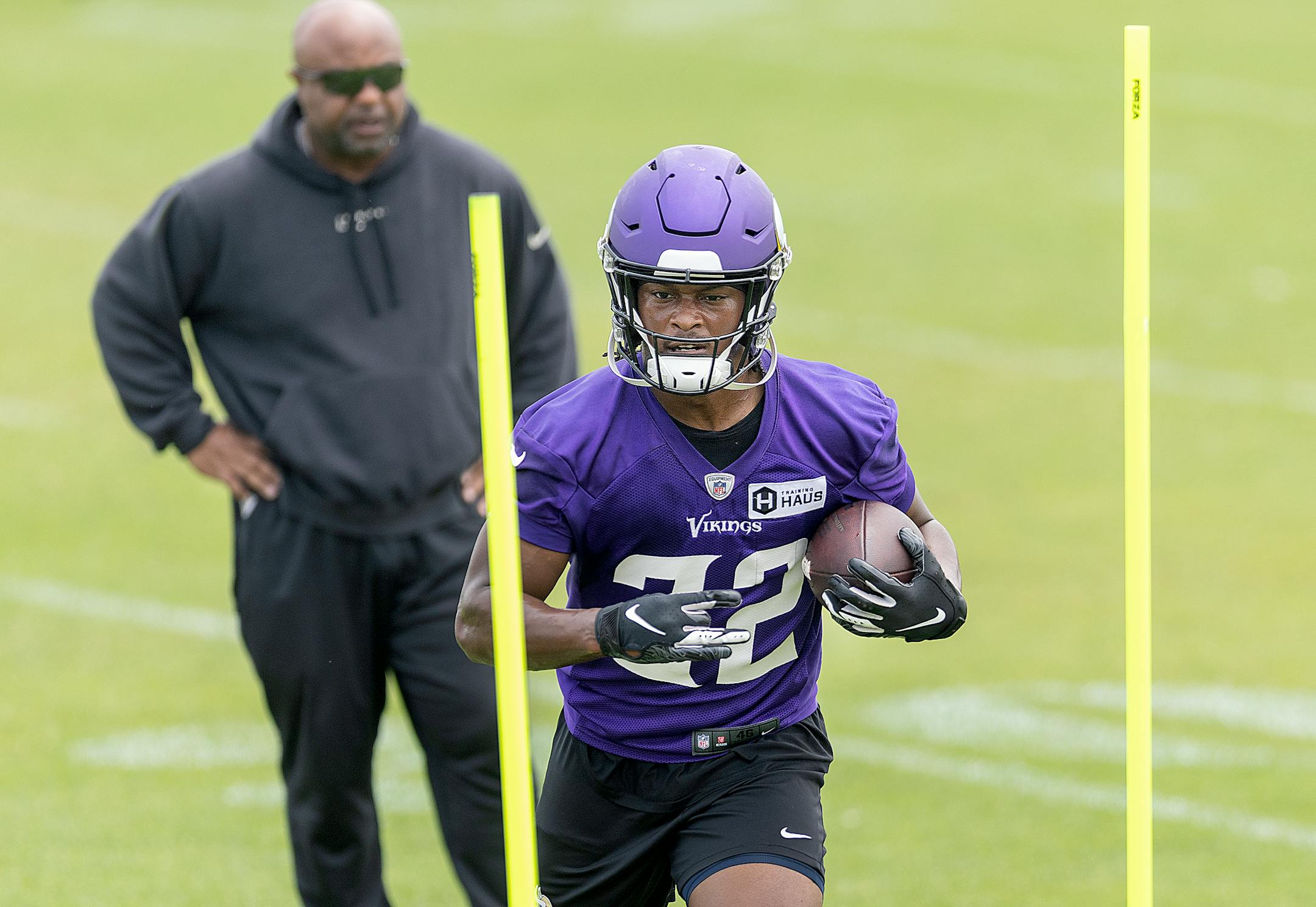 Vikings running back Ty Chandler runs through drills during practice at the TCO Performance Center in Eagan, Minn., on Tuesday, June 6, 2023.