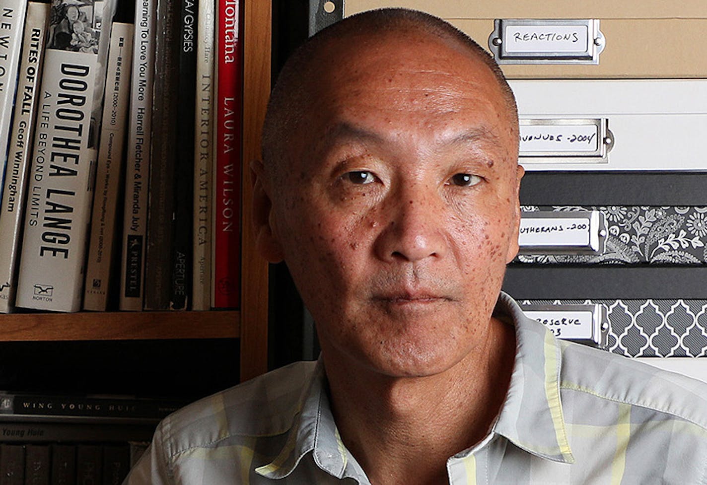 Photographer Wing Young Huie, this year's 2018 McKnight Distinguished Artist, poses for a portrait at his workspace on Aug. 11, 2018 in Minneapolis, Minn. (Anthony Souffle/Minneapolis Star Tribune/TNS) ORG XMIT: 1238666