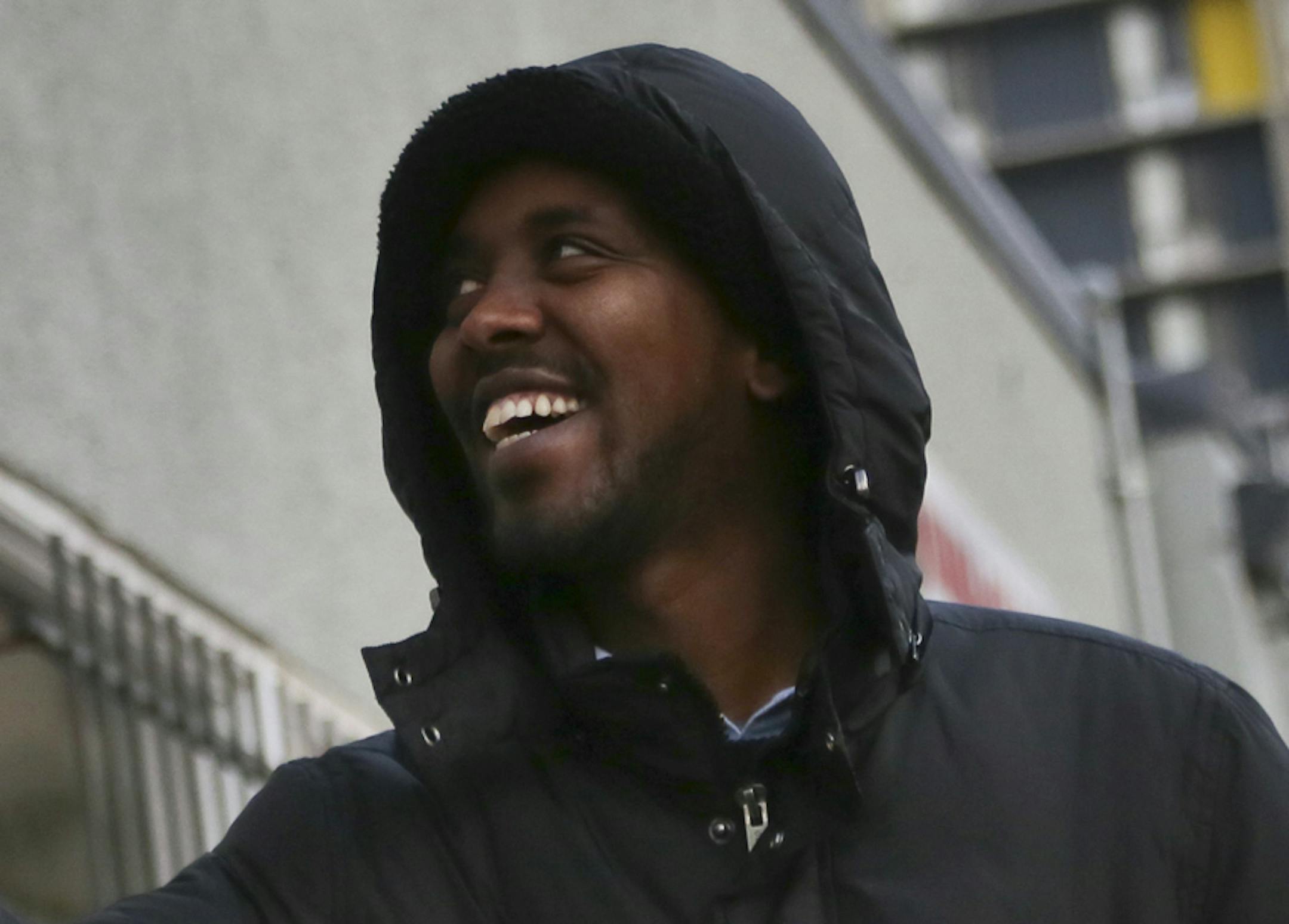 As the polls opened on election Tuesday, ward 6 city council candidate Abdi Warsame greeted volunteers who were headed out for the last campaign push outside his headquarters in the Cedar-Riverside neighborhood Tuesday, Nov. 5, 2013, in Minneapolis, MN. Warsame won in a landslide, garnering 64 percent of the vote and becoming the highest elected Somali-American in the country.](DAVID JOLES/STARTRIBUNE) djoles@startribune.com Minneapolis City Council race: Should know the results of some, includi