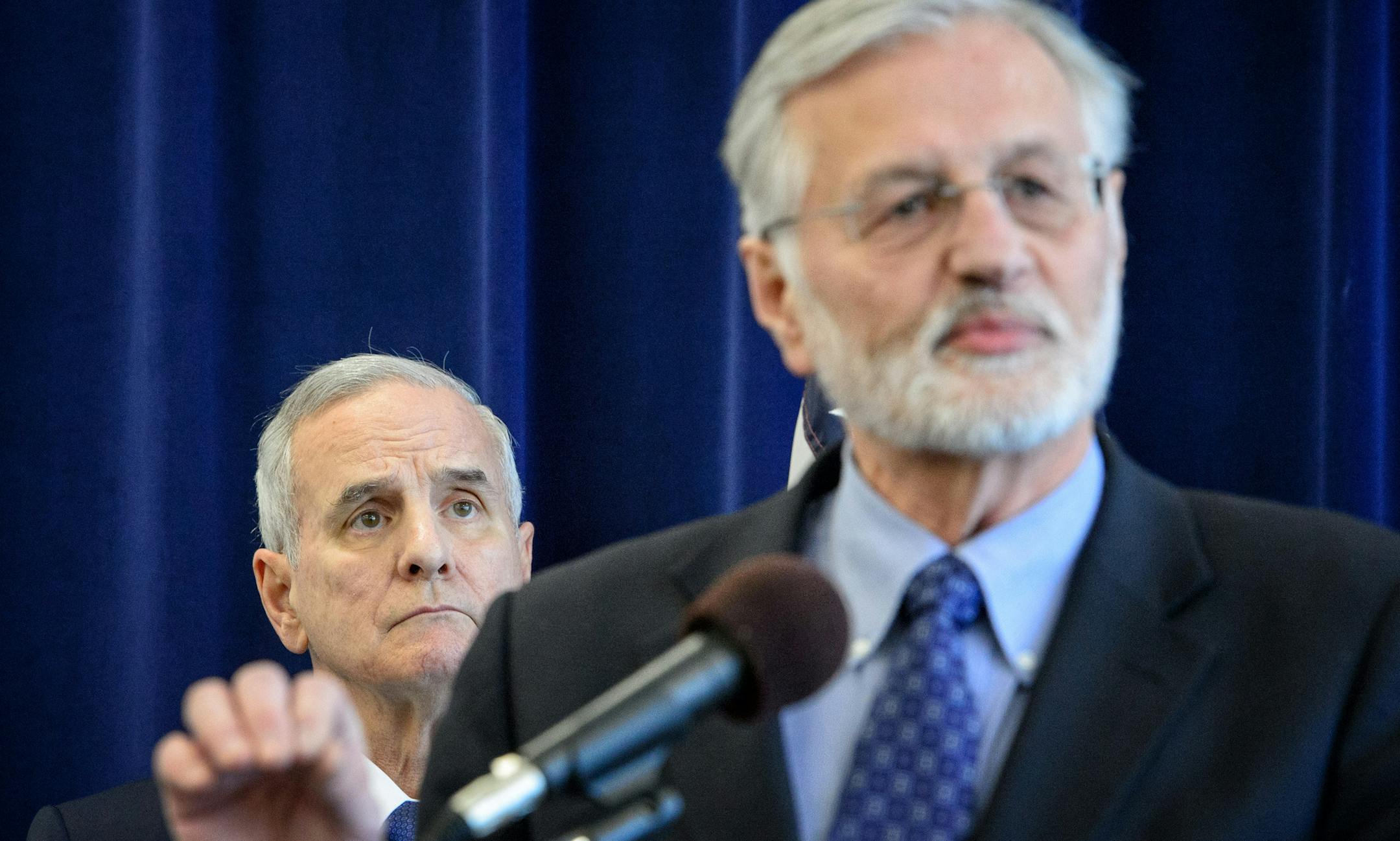 Dr. Bill Hartmann, Minnesota Board of Animal Health, behind him Governor Mark Dayton. ] GLEN STUBBE * gstubbe@startribune.com Thursday, April 23, 2015 Governor Mark Dayton today issued an emergency executive order declaring a peacetime state of emergency in Minnesota in response to the spread of avian influenza to the state's chicken and turkey flocks.