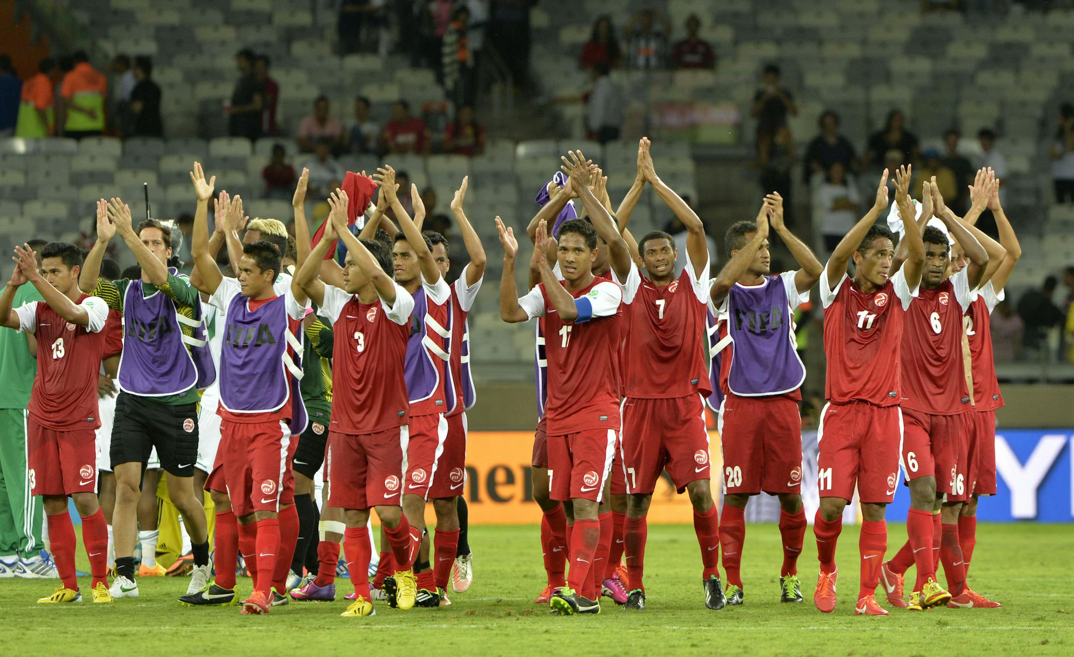 Tahiti players acknowledge the fans after losing 1-6 during the soccer Confederations Cup group B match between Tahiti and Nigeria in Belo Horizonte, Brazil, Monday, June 17, 2013. (AP Photo/Eugenio Savio)