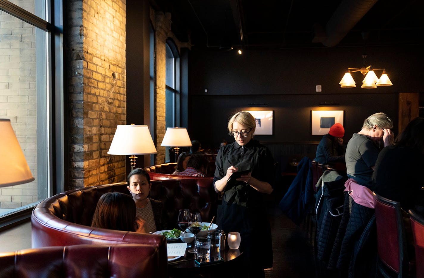 Server Suzie Nosal took an order at Snack Bar in Minneapolis, Minn., on Thursday, February 13, 2020.