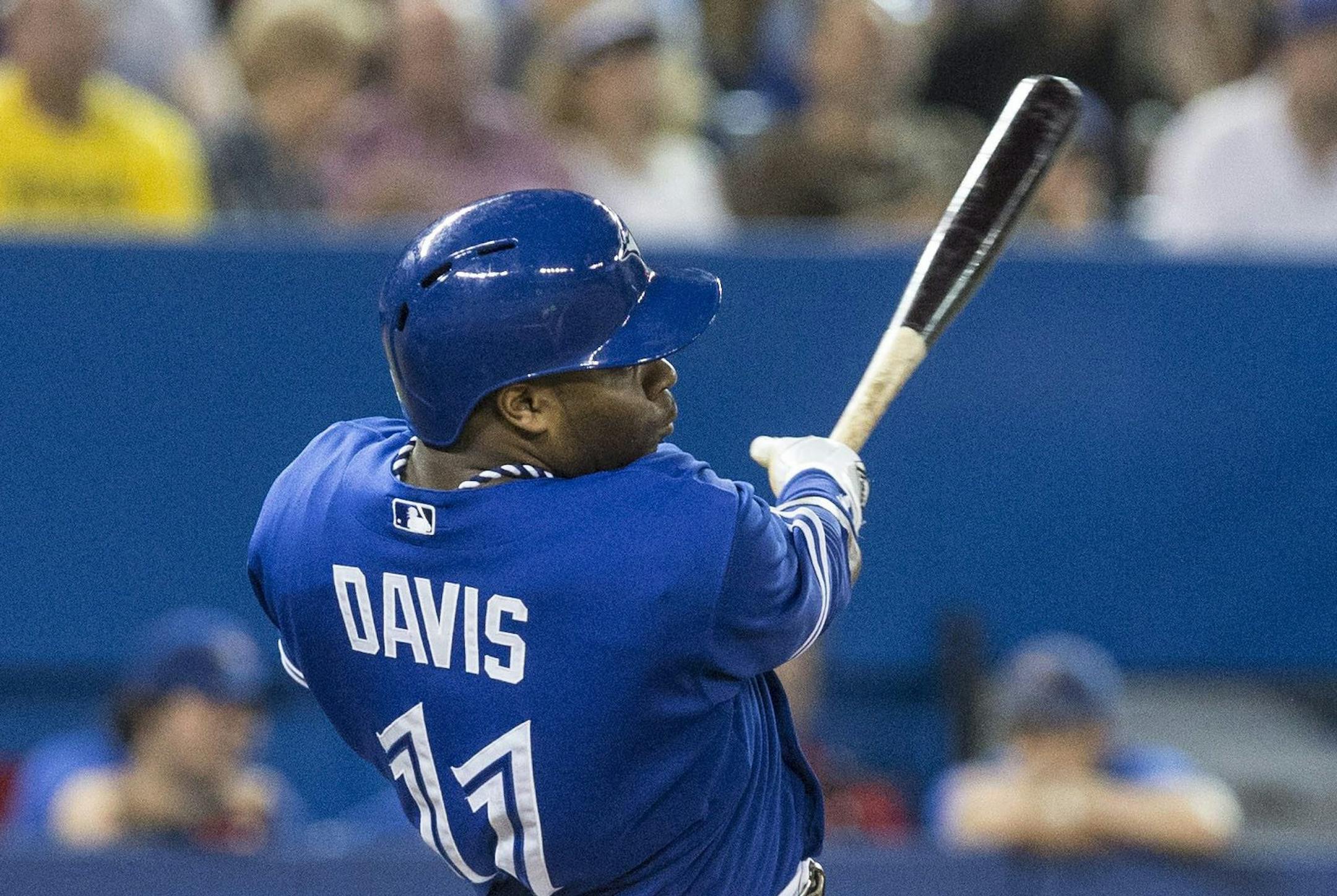 Toronto Blue Jays' Rajai Davis hits a three-run home run off Minnesota Twins pitcher Scott Diamond during fifth-inning AL baseball game action in Toronto, Sunday, July 7, 2013. (AP Photo/The Canadian Press, Chris Young)