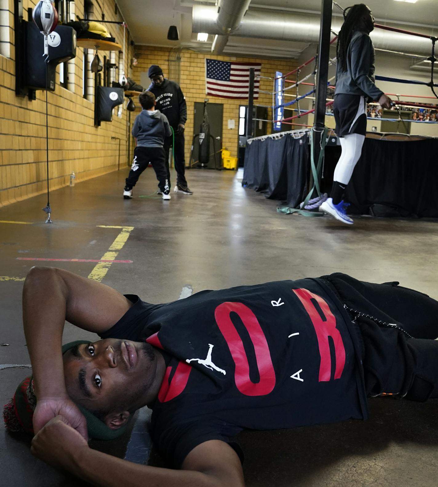 Davia "Machine" Holmes, 16, stretches while working out at Northside Boxing Club Monday in Minneapolis. Holmes is 4-1 as an amateur boxer. ] DAVID JOLES • david.joles@startribune.com Monday, Oct. 19k, 2020 in Minneapolis, MN. Northside Boxing Club was one of 40 groups that received extra grants from the Minneapolis Foundation this year. The foundation gave out $500,000 more this year to support healing, community conversations and racial justice work after George Floyd's death. Northside Boxing