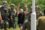 Almog Meir Jan, 21, one of four hostages who were kidnapped in a Hamas-led attack on Oct. 7, 2023, and was just rescued, arrives by helicopter to the 
