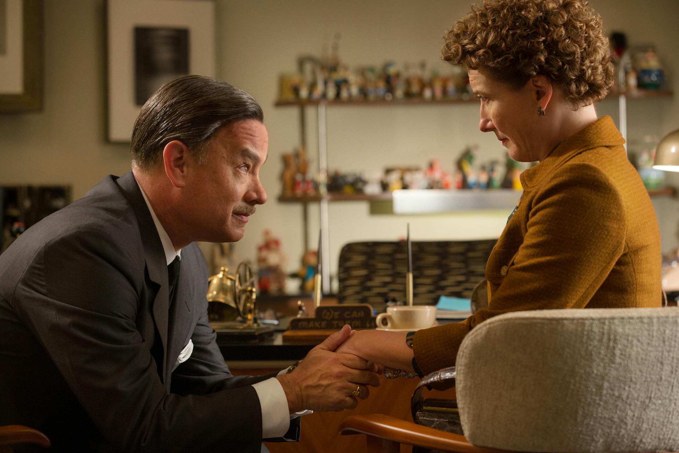 This image released by Disney shows Tom Hanks as Walt Disney, left, and Emma Thompson as author P.L. Travers in a scene from "Saving Mr. Banks." (AP Photo/Disney, FranÁois Duhamel)