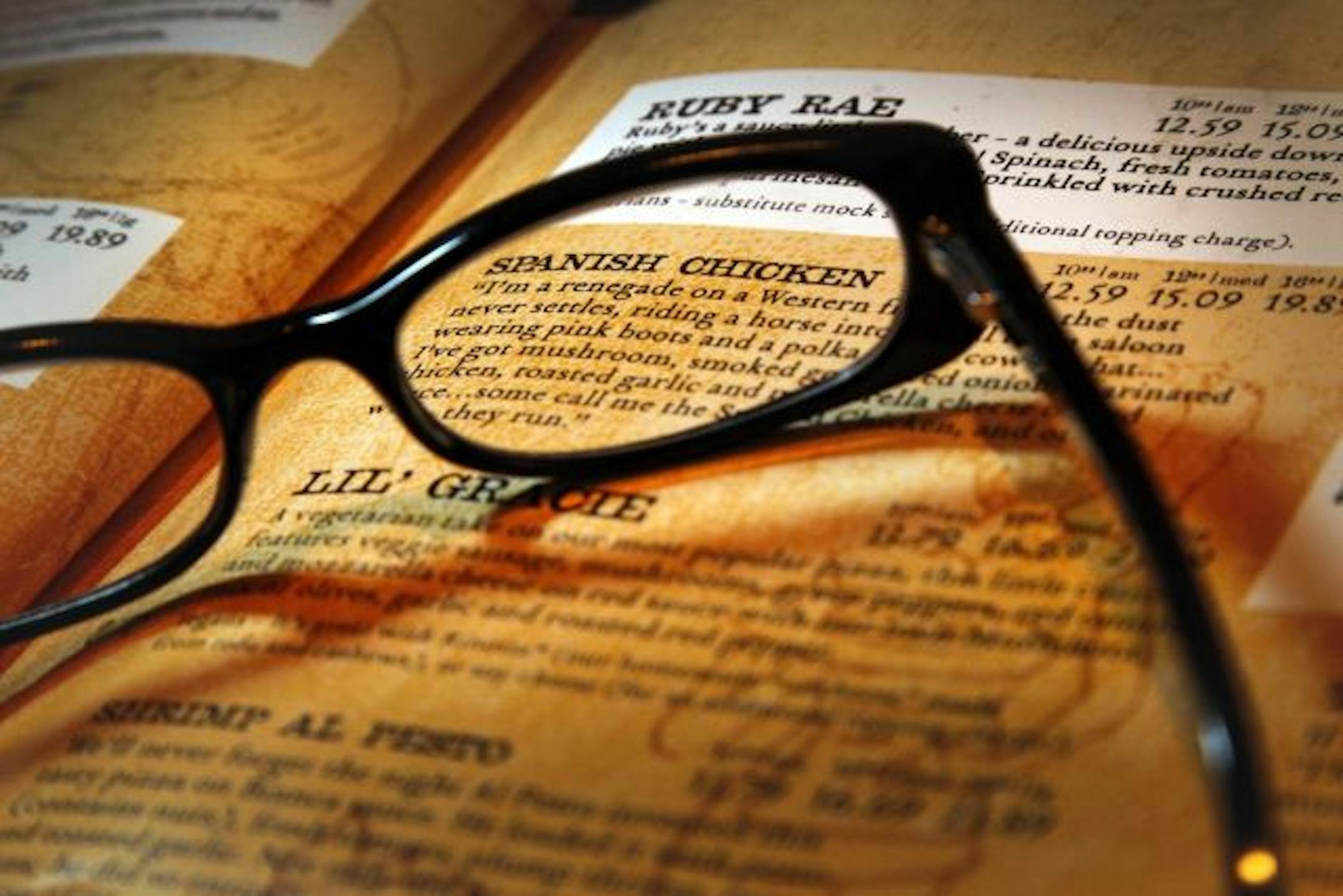 For some customers, "cheater" glasses are a must for reading menus.