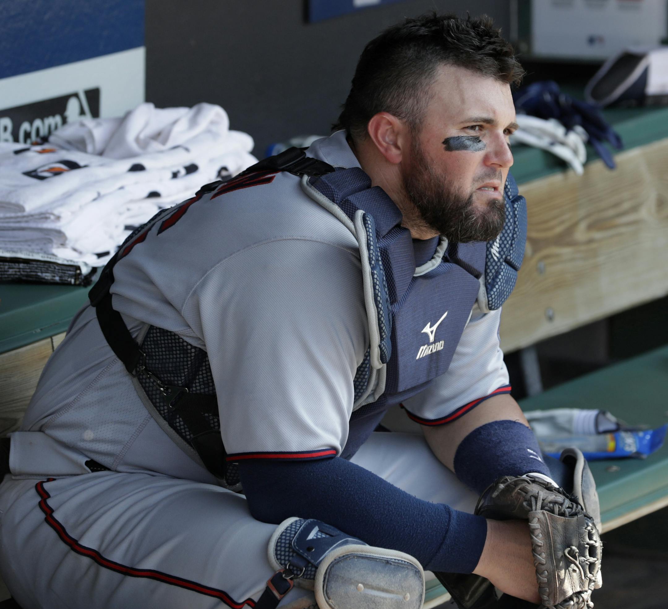 Minnesota Twins' Bobby Wilson sits in the dugout after the Cleveland Indians defeated the Twins 5-4 in a baseball game, Thursday, Aug. 9, 2018, in Cleveland. (AP Photo/Tony Dejak)