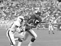 Ed Sharockman, Minnesota Vikings defensive back grabs pass intended for Philadelphia Eagles wide receiver Harold Jackson (29) on the 40-yard line and 