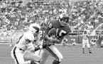 Ed Sharockman, Minnesota Vikings defensive back grabs pass intended for Philadelphia Eagles wide receiver Harold Jackson (29) on the 40-yard line and 