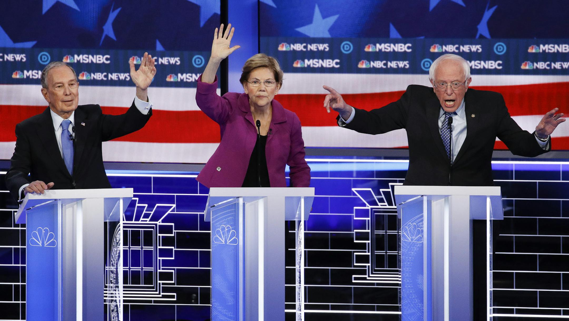 From left, Democratic presidential candidates, former New York City Mayor Mike Bloomberg, Sen. Elizabeth Warren, D-Mass., Sen. Bernie Sanders, I-Vt., participate in a Democratic presidential primary debate Wednesday, Feb. 19, 2020, in Las Vegas, hosted by NBC News and MSNBC. (AP Photo/John Locher)