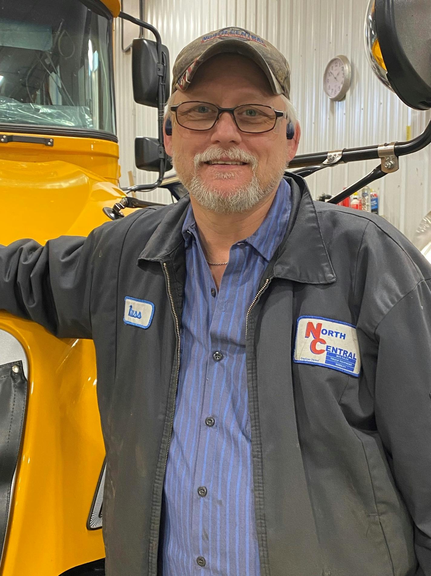 Russ Simmons, a diesel mechanic at the North Central Bus and Equipment Company, advises other former felons to get as much training as they can. He also tells potential employers about the tax credits and insurance available through the government.