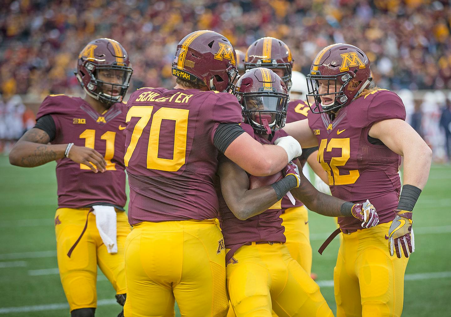 Minnesota's wide receiver Tyler Johnson was surrounded by teammates as they celebrated a touchdown during the first quarter as the Gophers took on Illinois at TCF Bank Stadium, Saturday, October 21, 2017 in Minneapolis, MN. ] ELIZABETH FLORES � liz.flores@startribune.com