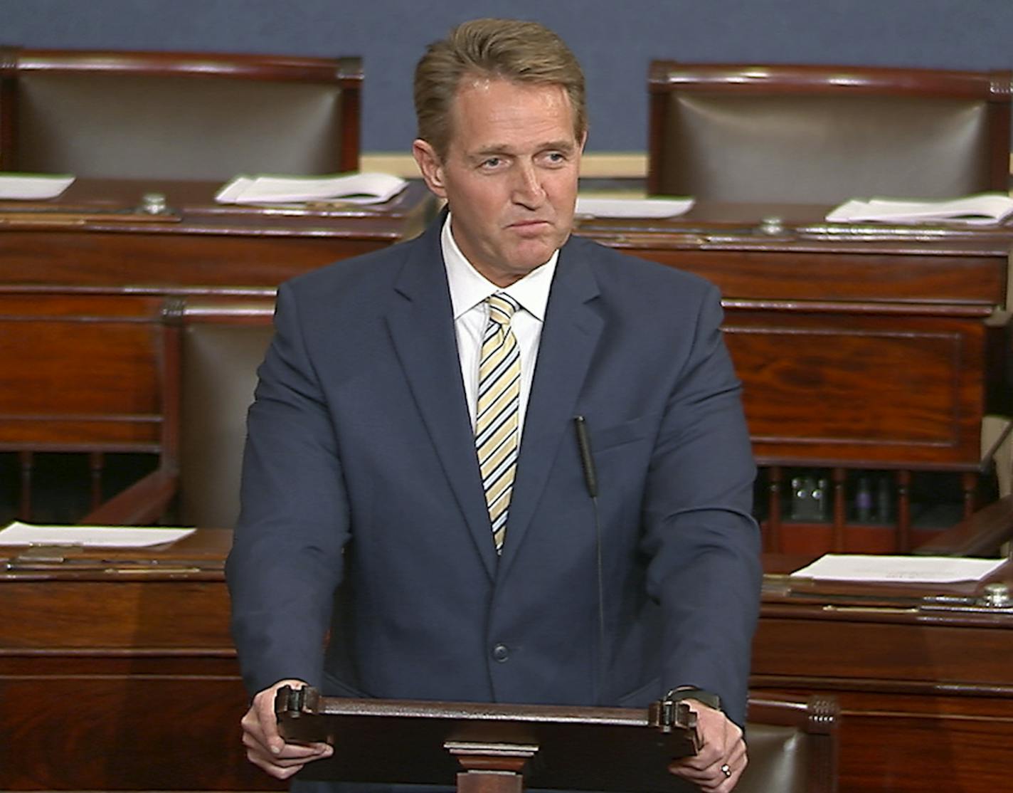 In this image from video from Senate Television, Sen. Jeff Flake, R-Ariz. speaks on the Senate floor, Wednesday, Jan. 17, 2017 at the Capitol in Washington. IFlake called Trump&#xed;s repeated attacks on the media &#xec;shameful&#xee; and &#xec;repulsive&#xee; and said Trump &#xec;has it precisely backward.&#xed;&#xed; Flake said despotism is the enemy of the people, while a free press is the despot&#xed;s enemy and a guardian of democracy. (Senate TV via AP)