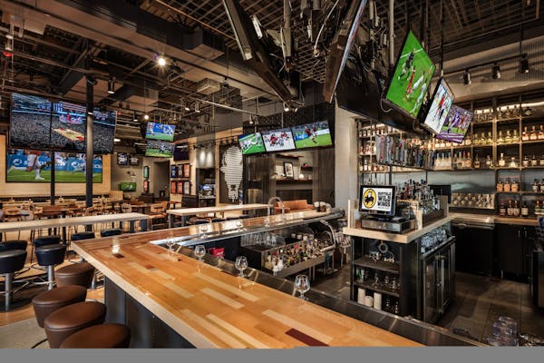 Buffalo Wild Wings will allow sports betting in some of its restaurants this fall, relying on a partnership with MGM Resorts International.