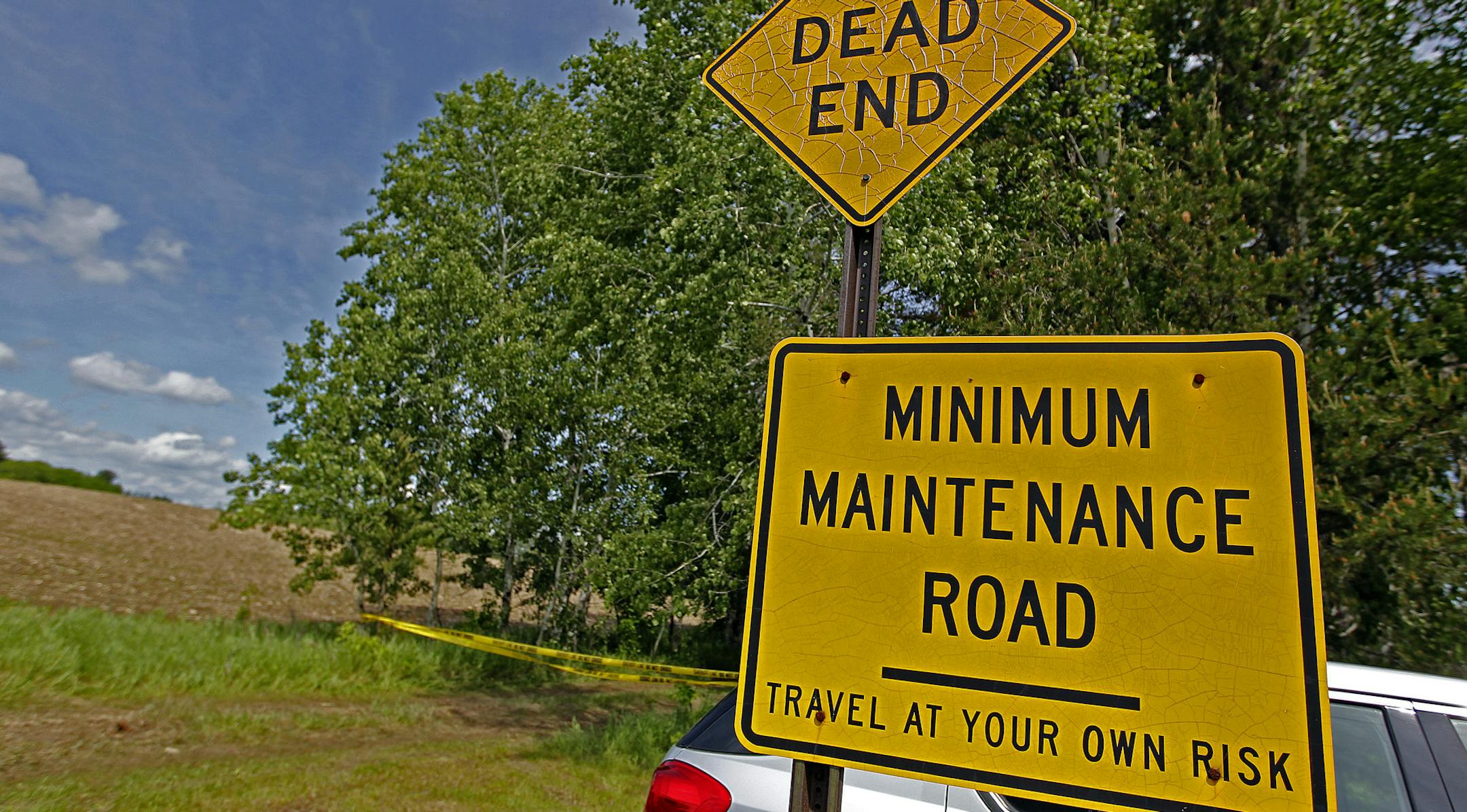Warning signs posted at the entryway onto a dirt road where police are searching a property in Stanchfield, MN, Tuesday, June 3, 2014. On Monday, June 2, 2014 at approximately 9:00 a.m., the Maple Grove Police Department executed a search warrant near the 37000 block of Verdin Street NW, Stanchfield, MN. The search is part of the 1989 missing Amy Sue Pagnac case. ] (ELIZABETH FLORES/STAR TRIBUNE) ELIZABETH FLORES • eflores@startribune.com