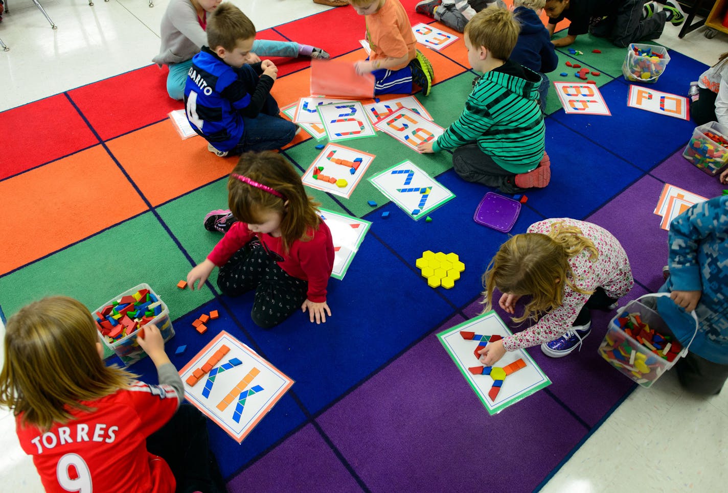 (This photo was originally taken, but no used, for a 11/17 story about all-day K metrowide. So photo caption for the West Extra should be more general and just say "recently.") Kintergarteners did alphabet puzzles in Kristin Koloski's all-day Kindergarten class at Meadowbrook Elementary in Golden Valley. Friday, November 15, 2013. ] GLEN STUBBE * gstubbe@startribune.com