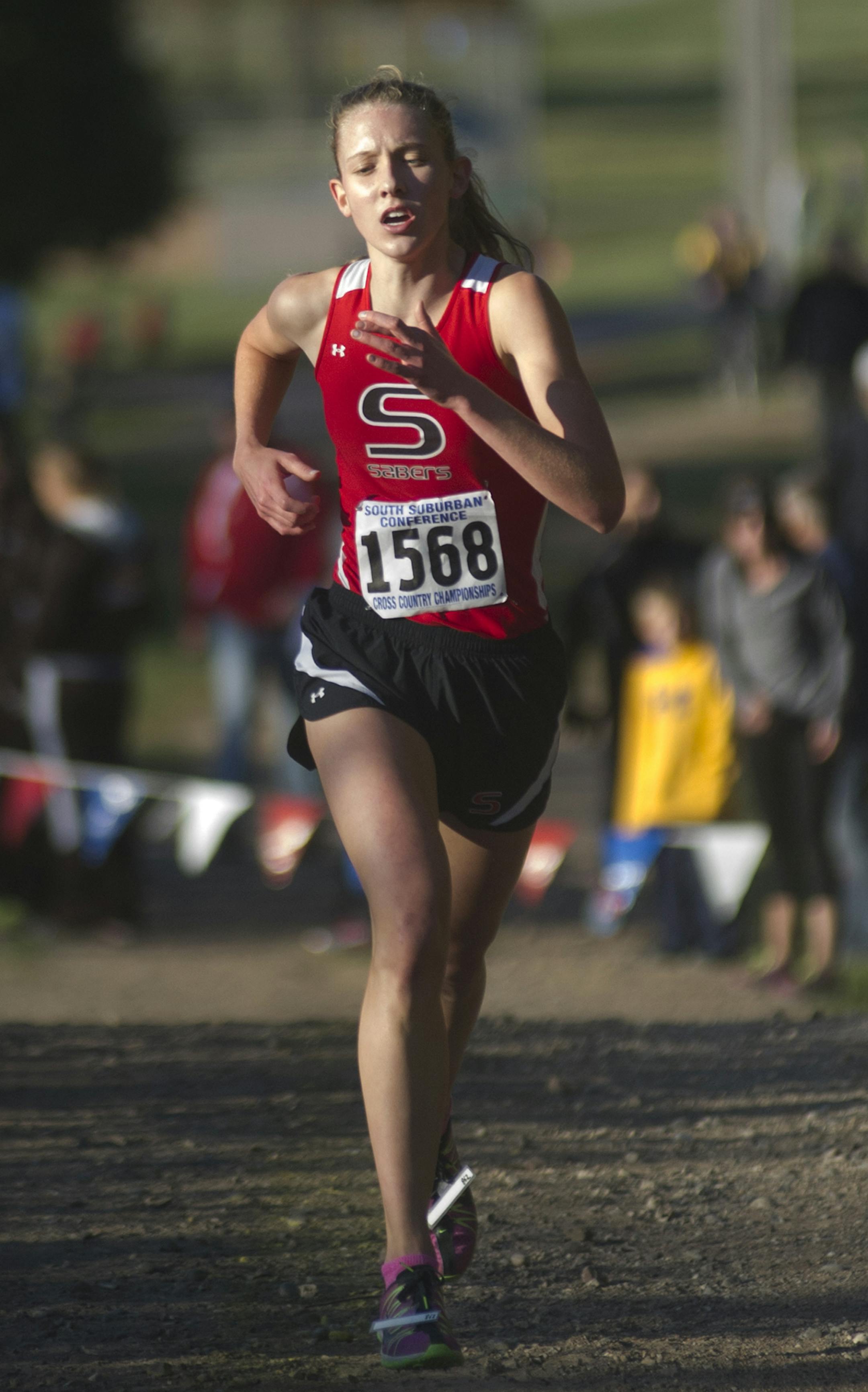 Shakopee's Tess Misgen, wearing bib 1568, is at the front of the pack during the South Suburban Conference Cross Country Meet, Friday at Eagan High School. ] (Matthew Hintz, 101514, Eagan)