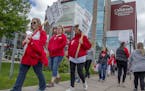 Nurses and their supporters picketed on the sidewalk outside Children's St. Paul and United Hospital, Thursday, May 23, 2019 in St. Paul, MN. Nurses a