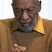In this Nov. 6, 2014 file photo, entertainer Bill Cosby pauses during a news conference. Cosby's attorney said Sunday, Nov. 16, 2014 that Cosby will n