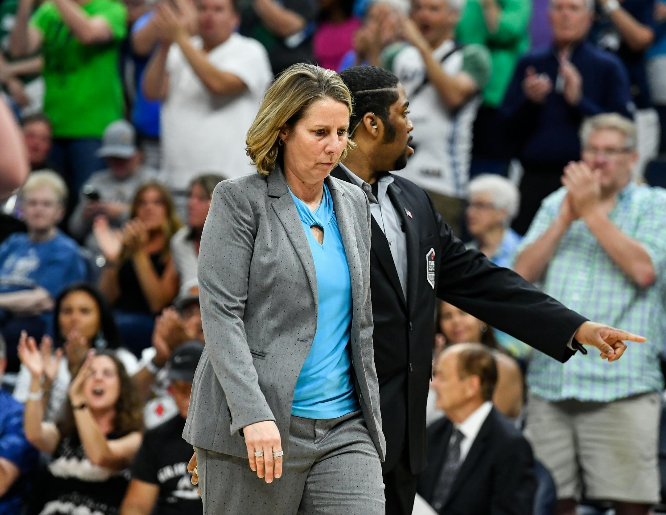 Minnesota Lynx head coach Cheryl Reeve walked out of the arena after being ejected following a double technical foul in the second half against the Los Angeles Sparks.