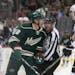 Wild center Ryan Carter and Stars defenseman John Klingberg were held back by the refs in a game last February at Xcel Energy Center.