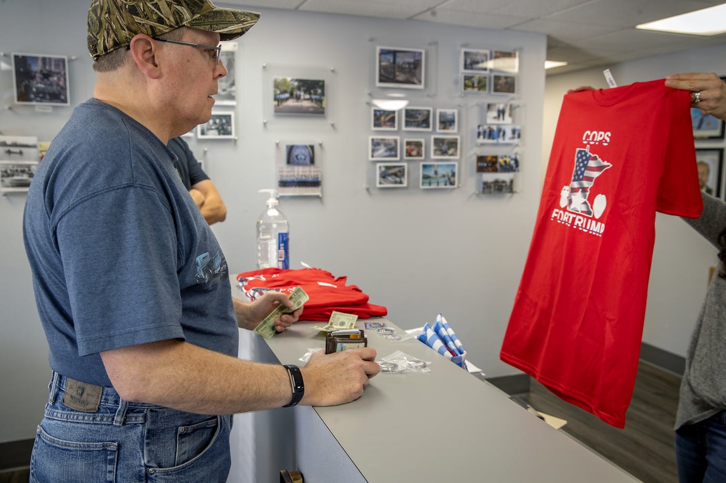 Corcoran Police Officer Perry Rowen purchased a "Cops for Trump" t-shirt at the Minneapolis Federation building, Monday, October 7, 2019 in Minneapolis, MN. The Minneapolis police union has come out with a "Cops for Trump" t-shirt, just days the Police Department said officers can no longer appear in uniform in support of candidates at political events or in advertisements.