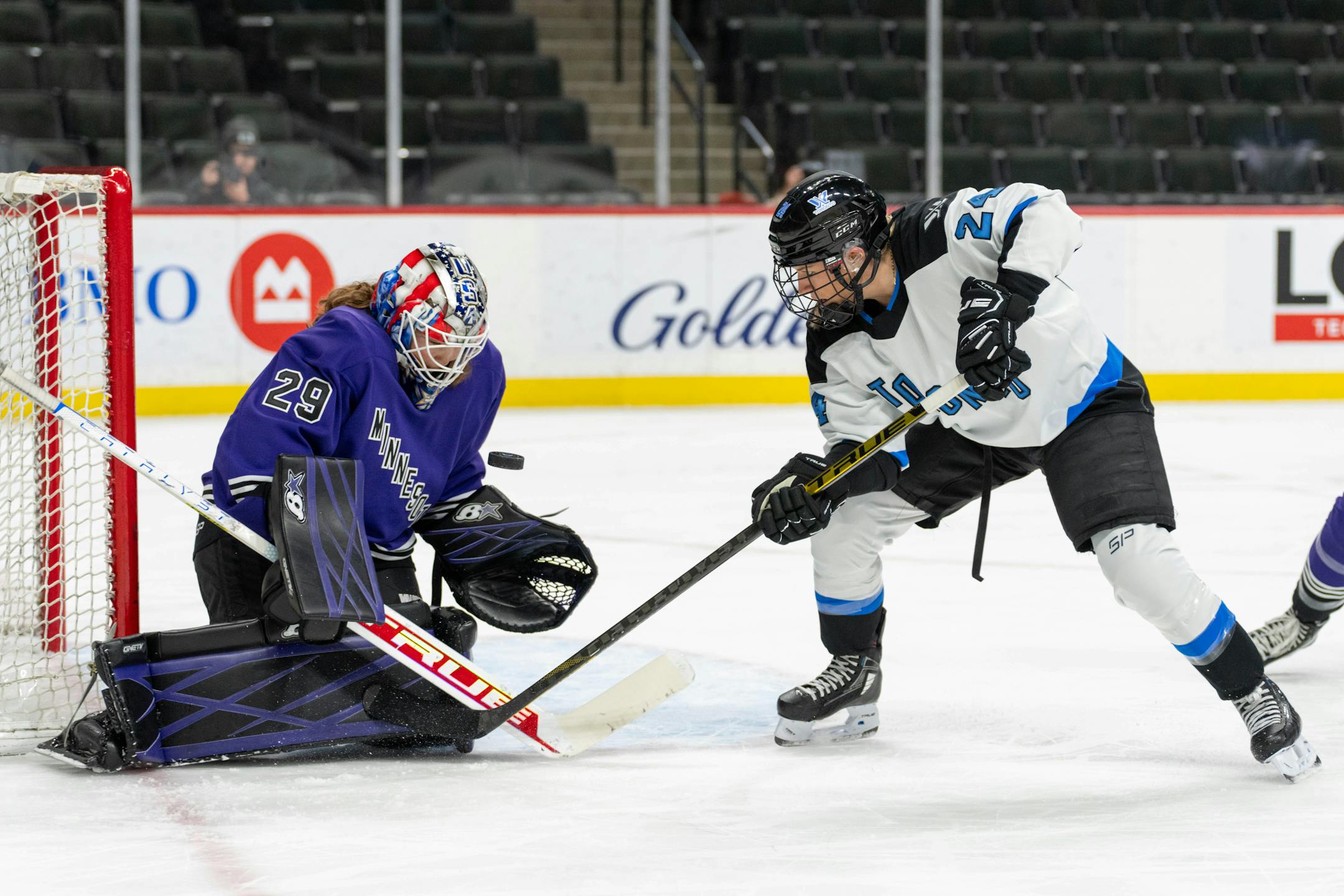 Minnesota goalie Nicole Hensley (29) stops a shot by Toronto forward Natalie Spooner (24) in the first period between Minnesota and Toronto of the PWHL at the Xcel Energy Center in St. Paul on Wednesday, Jan. 10, 2024. Photo by Matt Blewett, Special to Star Tribune matt@mattebphoto.com