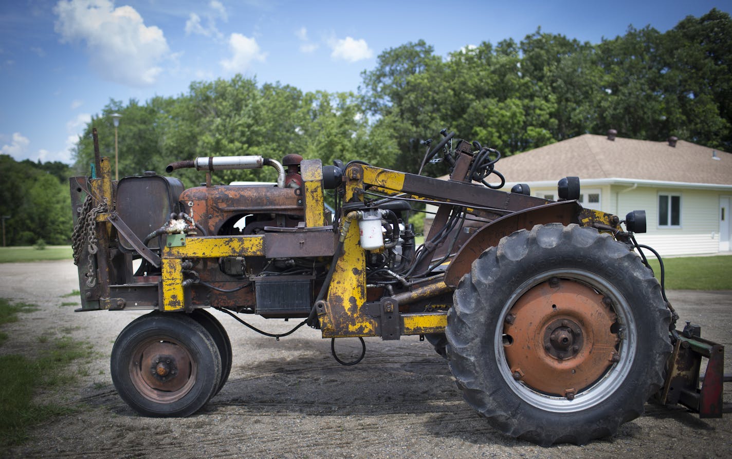 The 1947-model Allis Chalmers tractor re-engineered by farmer Duane Fuglie and photographed on Tuesday, June 23, 2015, in Ulen, Minn. This tractor killed 24-year-old Jake Fuglie who tipped it while plowing snow. ] RENEE JONES SCHNEIDER &#x2022; reneejones@startribune.com