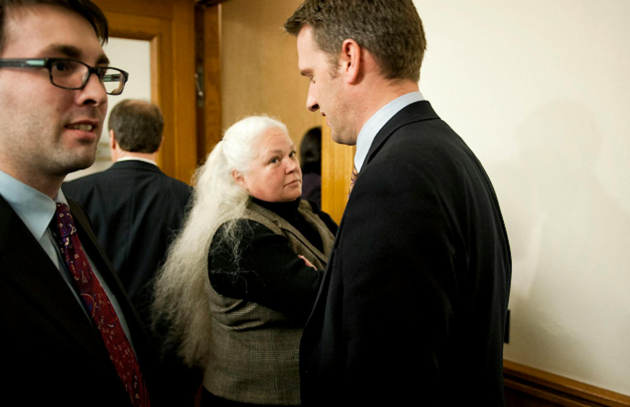GOP leaders listened in the back of the room as  House DFLers talk about their tax plan, L to R Bobby Patrick, assistant to minority leader, Rep. Mary Liz Holberg and Minority Leader Kurt Daudt.  House Democrats want those making more than $500,000 to come up with about $854 million over the next two years, paying back K-12 public schools.   Tuesday, March 19, 2013.   ]   GLEN STUBBE * gstubbe@startribune.com