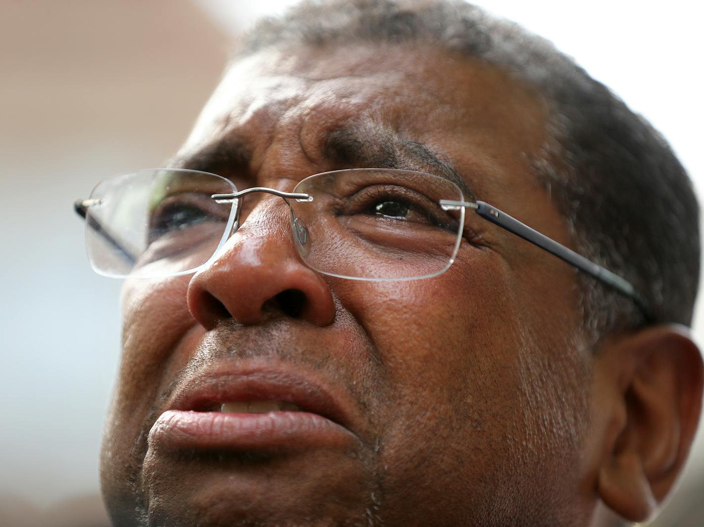 Pastor Brian Herron of Zion Baptist Church of Minneapolis speaks during a press conference at the governor's residence. ] (Leila Navidi/Star Tribune) leila.navidi@startribune.com BACKGROUND INFORMATION: Protesters at the governor's residence in St. Paul on Thursday, July 7, 2016, one day after Philando Castile of St. Paul died after being shot by police in Falcon Heights, the aftermath of which was recorded in a video widely shared on Facebook.