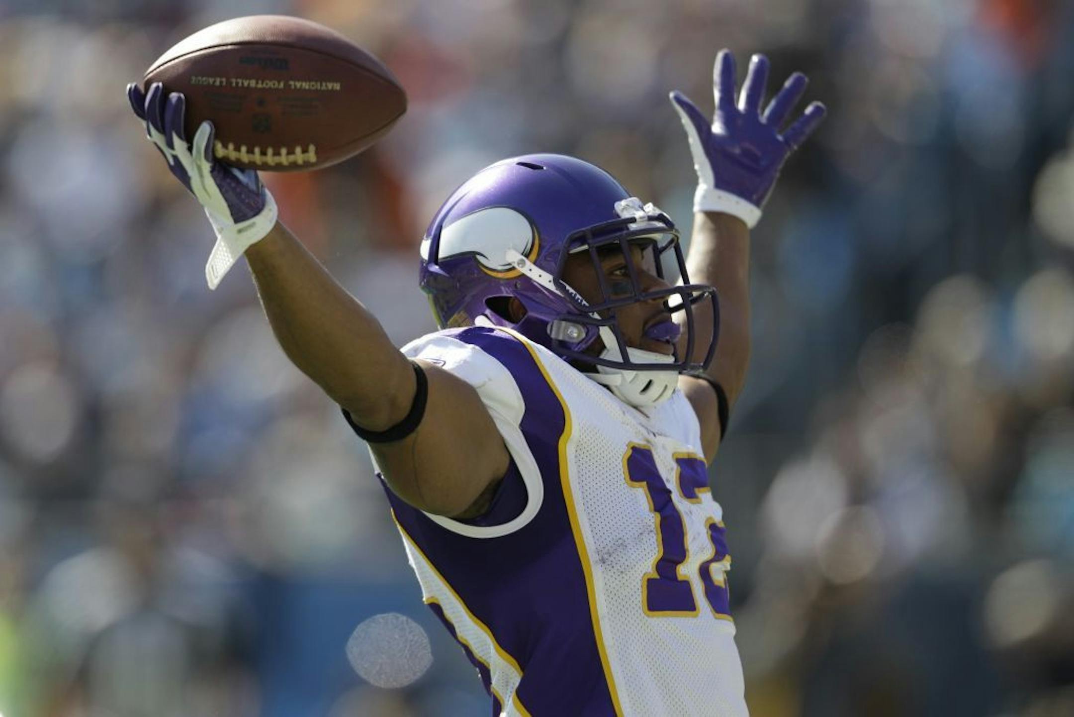 The Vikings' Percy Harvin celebrated his first-quarter touchdown against the Carolina Panthers.