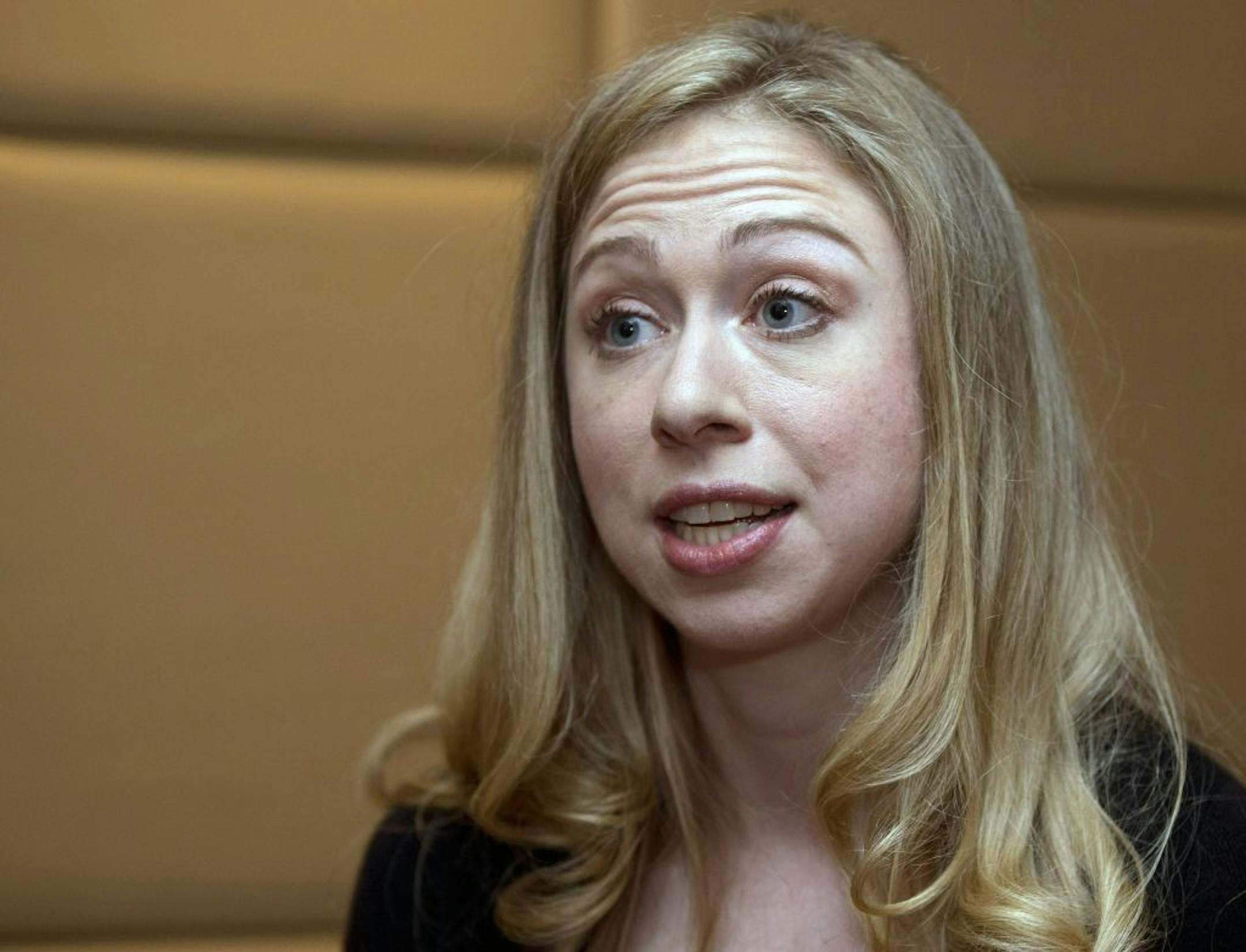 FILE - In this Tuesday, May 28, 2013, file photo, Chelsea Clinton, from the Clinton Foundation, speaks during an interview at the Women Deliver conference in Kuala Lumpur, Malaysia. Clinton is quitting her job as a reporter at NBC News. Clinton has been working at the network since 2011, sporadically doing feature stories on people or organizations doing public-spirited work. The network announced her exit on Friday, Aug. 29, 2014. She was initially hired to do stories for Brian Williams' "Rock