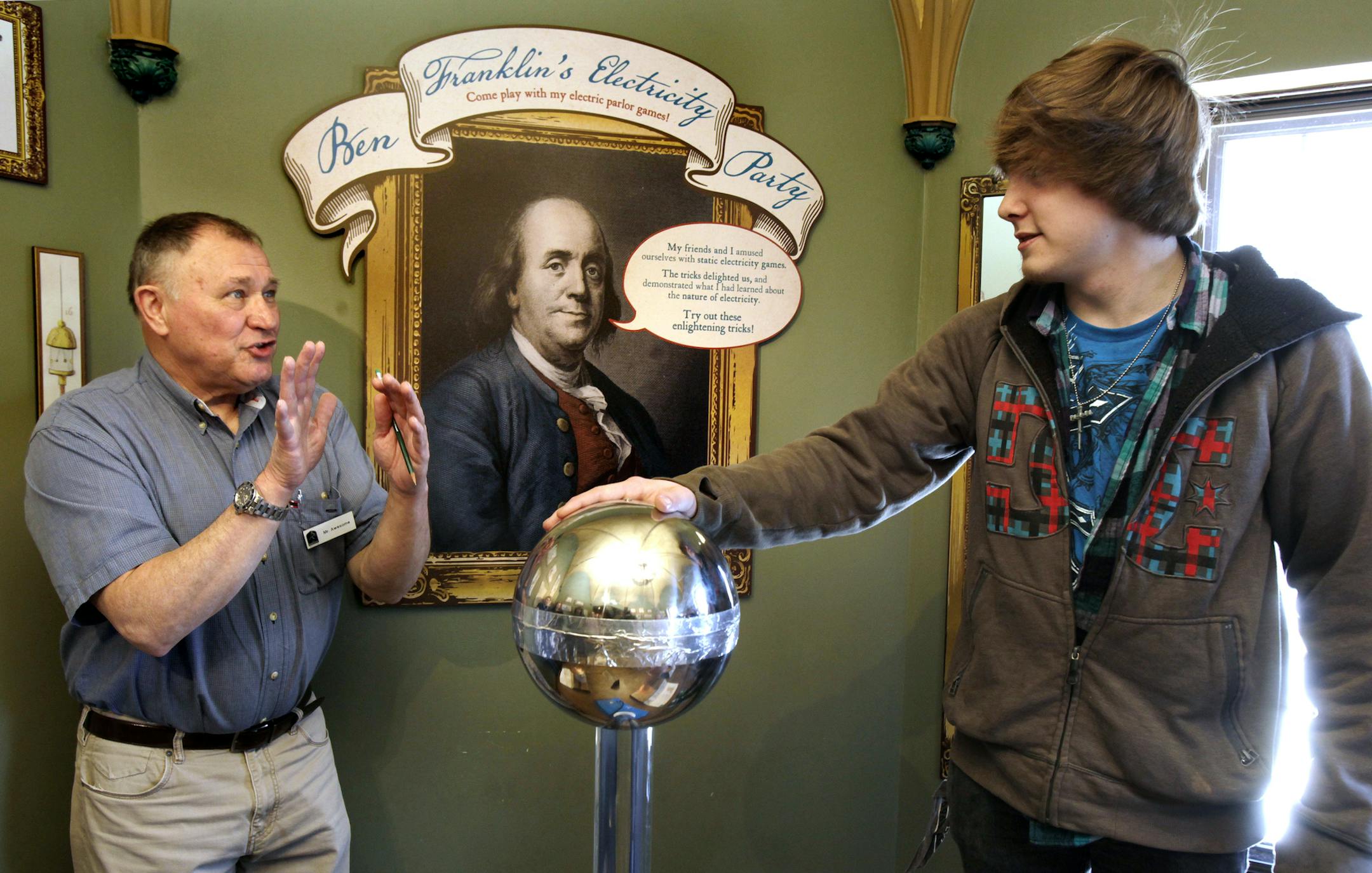 Richard Johnson, (left) a volunteer at the Bakken Museum, shows student Spencer Stanley of North Oaks Academy in Forest Lake a experiment on static electricity at the Bakken Museum located at 3537 Zenith Avenue South in Minneapolis, MN 55416 on April 1, 2013. ] JOELKOYAMA‚Ä¢joel koyama@startribune.com Richard Johnson, a volunteer I'm profiling, will be showing students throuh the Bakken Museum.