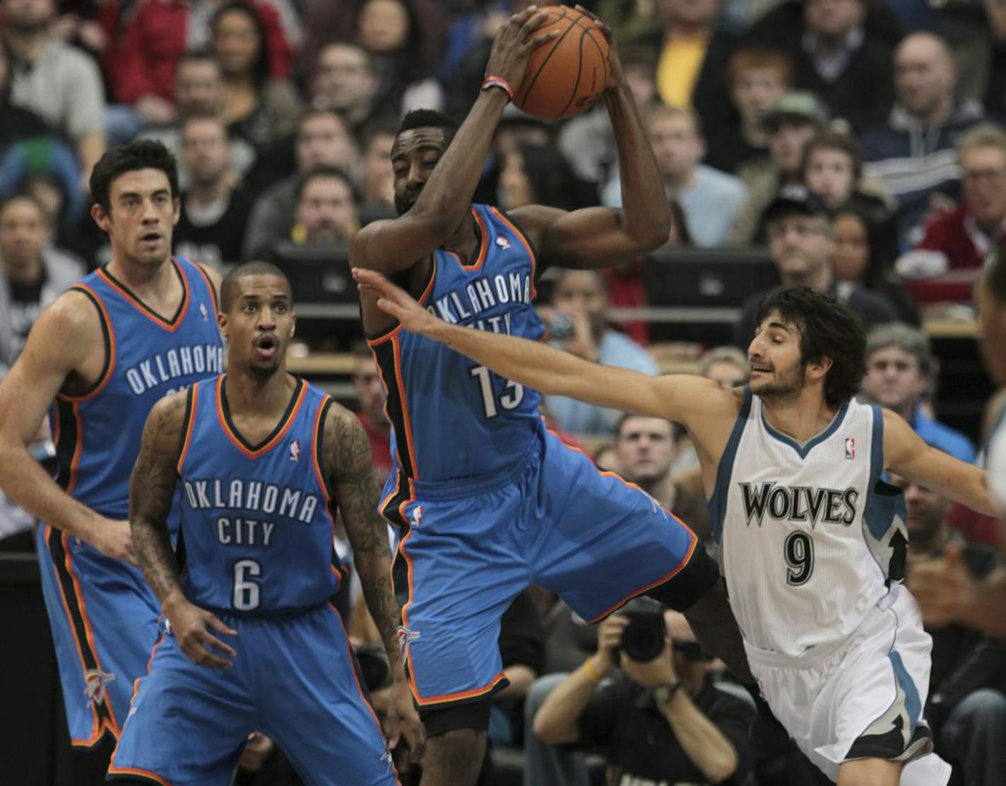 Ricky Rubio tried to steal the ball from the Thunder's James Harden.