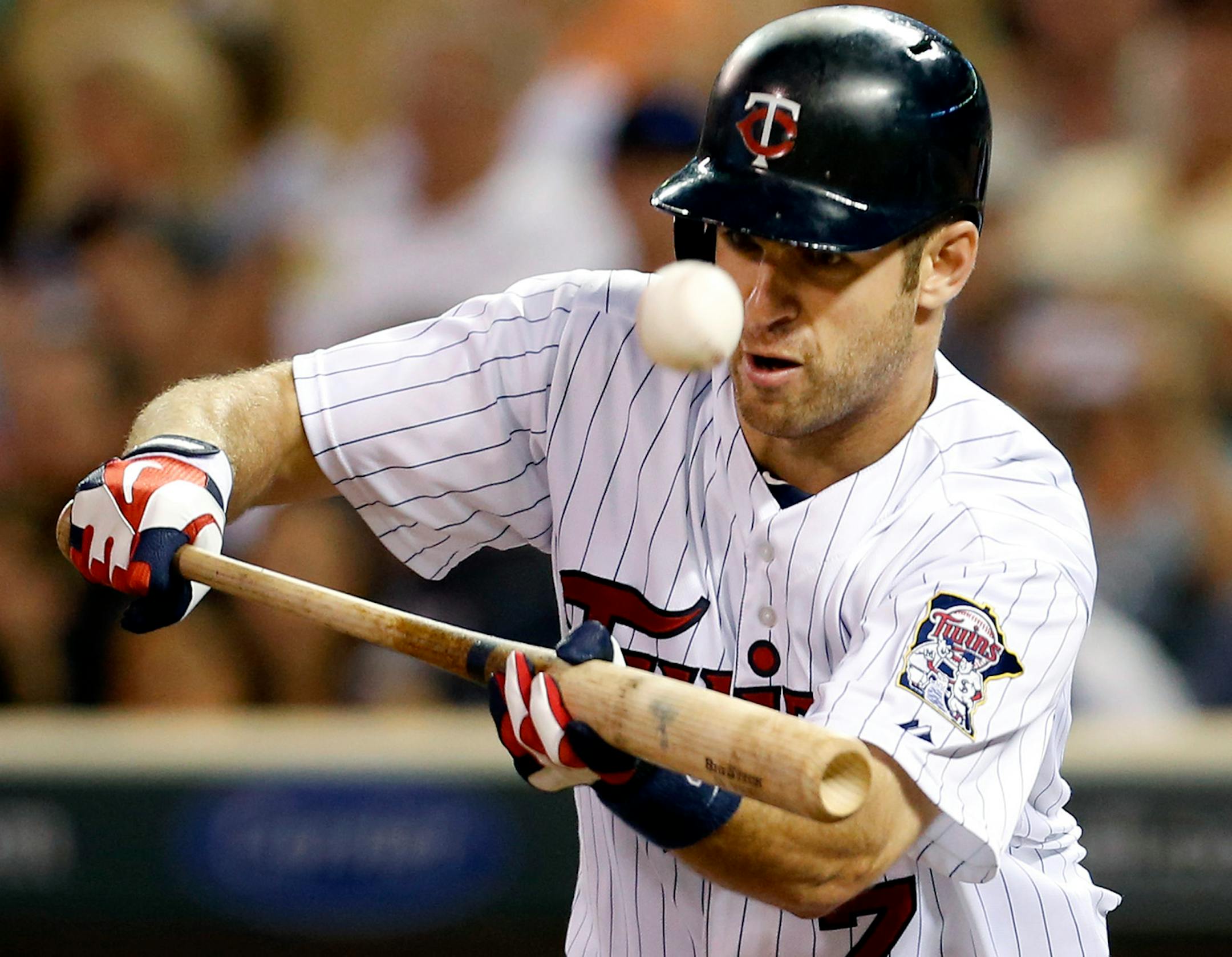 Twins catcher Joe Mauer was feeling "a little under the weather" when he came to Target Field on Monday, so manager Ron Gardenhire decided to keep him on the bench for a day.