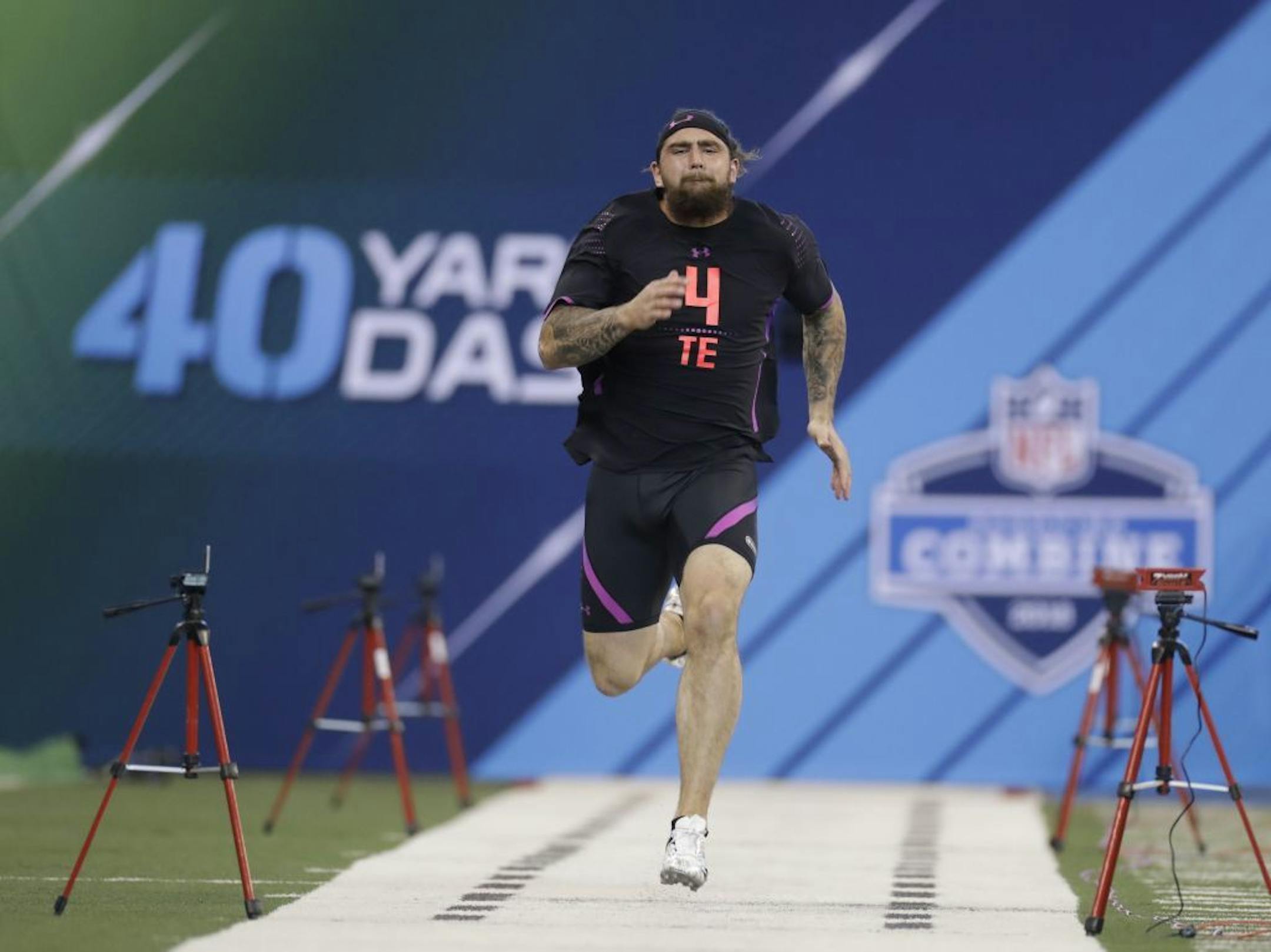 Central Michigan tight end Tyler Conklin runs the 40-yard dash during the NFL football scouting combine, Saturday, March 3, 2018, in Indianapolis.