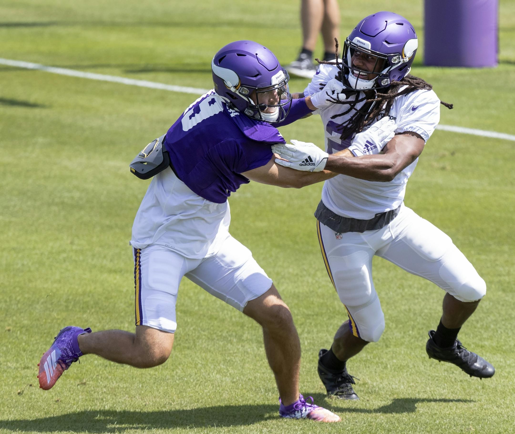 Trae Waynes (26) covered Adam Thielen (19) during practice on Wednesday.