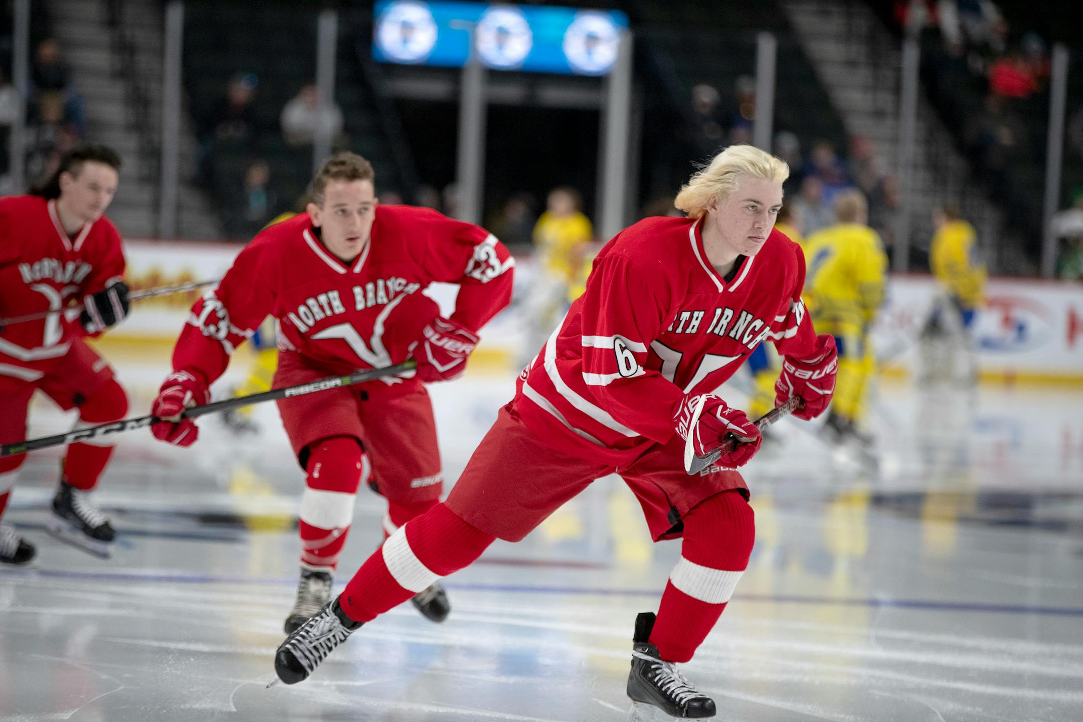 Brennen James led North Branch onto the ice before the Vikings played St. Cloud Cathedral on Wednesday at Xcel Energy Center in a Class 1A hockey state quarterfinal.