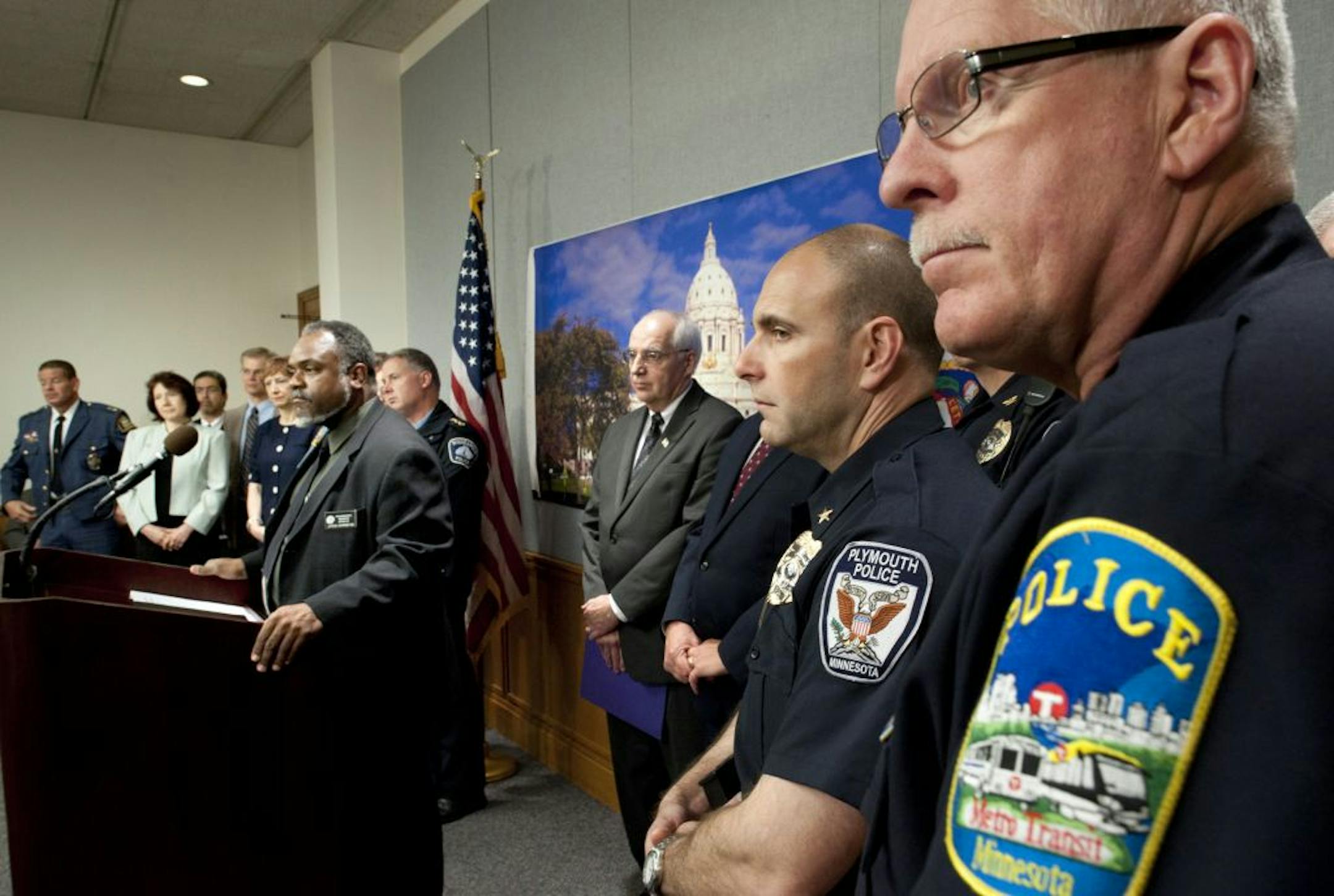 With police chiefs, prosecutors and legislators on either side of him, Sen. John Harrington, DFL-St. Paul — himself a former chief of police — said the proposal is "broadly misguided" and that it would "increase danger to the public and increase danger to the police."
