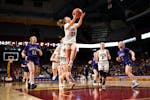 Providence Academy guard Maddyn Greenway (30) scores a layup against Albany in the second half Saturday, March 18, 2023 during the Class 2A girls' bas