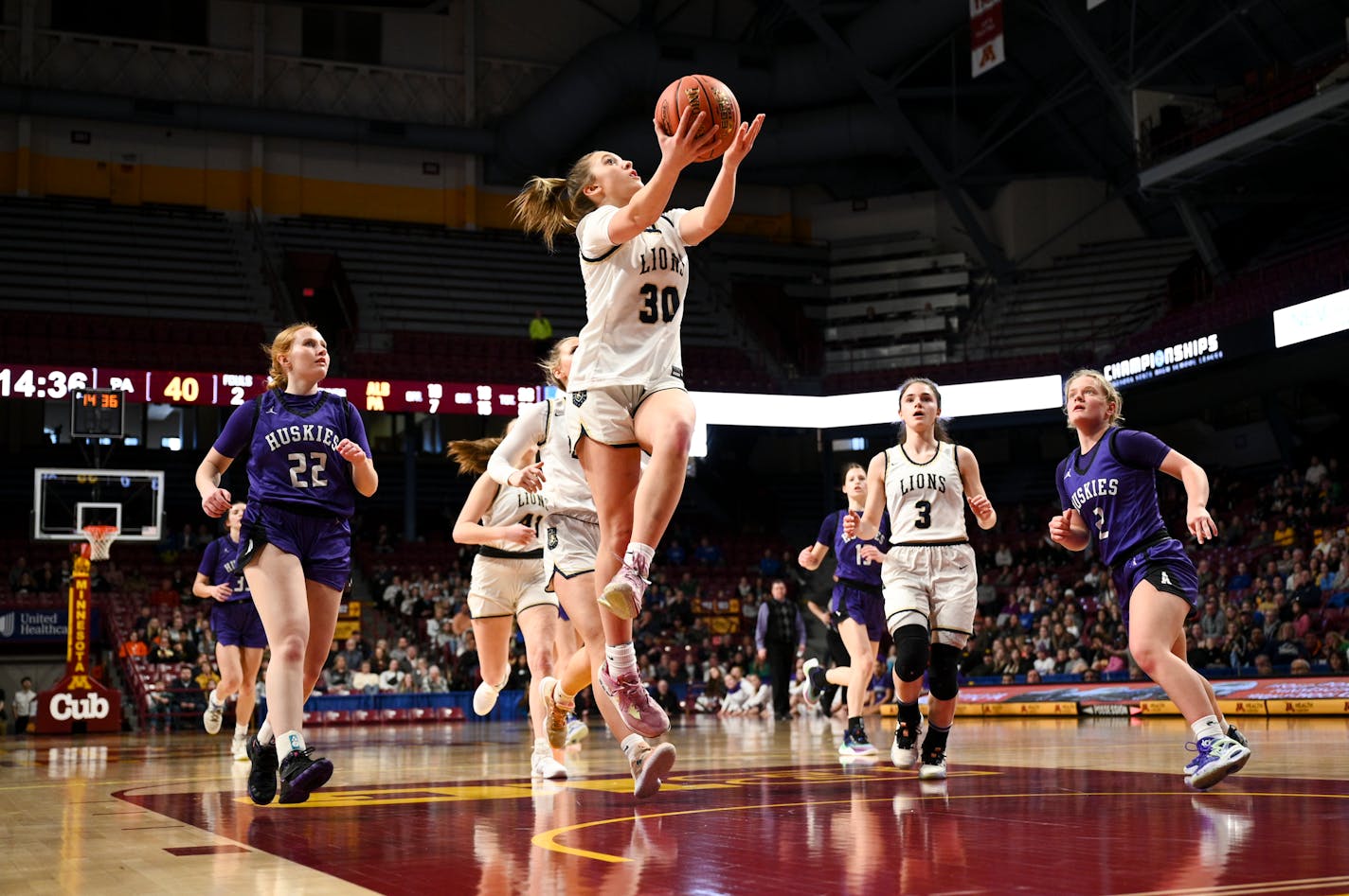 Providence Academy guard Maddyn Greenway (30) scores a layup against Albany in the second half Saturday, March 18, 2023 during the Class 2A girls' basketball state tournament championship game at Williams Arena in Minneapolis, Minn.. ] AARON LAVINSKY • aaron.lavinsky@startribune.com