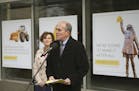 Mayor Betsy Hodges looks on as Steve Cramer, president and CEO of the Minneapolis Downtown Council speaks to the press about the Nicollet Mall reconst